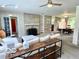Spacious living room with a stone fireplace, built-in shelving, and comfortable seating at 1802 Laurel Dr, Columbus, IN 47203