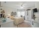 Bright bedroom with ceiling fan, area rug and comfortable decor at 18112 Kinder Oak Dr, Noblesville, IN 46062