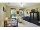 bedroom with neutral carpet, light-green walls, and two large windows at 18112 Kinder Oak Dr, Noblesville, IN 46062