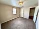 A bedroom featuring carpet floors, neutral walls, and white trim at 1908 S Biltmore Ave, Muncie, IN 47302