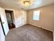 A bedroom featuring carpet floors, neutral walls, and white trim at 1908 S Biltmore Ave, Muncie, IN 47302