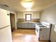 Functional kitchen with light cabinets, wood countertops, and a gas range at 1908 S Biltmore Ave, Muncie, IN 47302