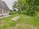 An expanse of green backyard space surrounds the home at 1910 W 10Th St, Anderson, IN 46016