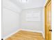 Bright bedroom with hardwood floors, neutral walls, and a closet at 1910 W 10Th St, Anderson, IN 46016