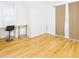 Bedroom featuring a built-in desk area and neutral color palette at 1910 W 10Th St, Anderson, IN 46016