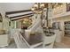 Dining Room with views into the Kitchen, including a fireplace, staircase and stainless appliances at 1927 E Derby Ct, Martinsville, IN 46151