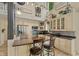 Kitchen island with seating and stainless steel appliances at 1927 E Derby Ct, Martinsville, IN 46151