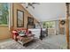 Sunlit main bedroom featuring a sitting area, neutral carpet, and decorative accents at 1927 E Derby Ct, Martinsville, IN 46151