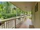Inviting covered porch showcasing a serene view and well-maintained surroundings in a quiet neighborhood at 1927 E Derby Ct, Martinsville, IN 46151
