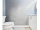 Bathroom view with toilet and vanity with white cabinets at 2126 Tartan Rd, Anderson, IN 46012