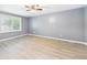 Bedroom showcasing window and ceiling fan at 2126 Tartan Rd, Anderson, IN 46012