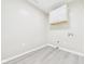 Laundry room with upper cabinet and washer hookups at 2126 Tartan Rd, Anderson, IN 46012