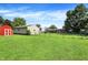 Large, fenced backyard with a barn, detached garage, and house at 2608 E 500 N, Whiteland, IN 46184