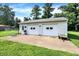 Detached two car garage with an open parking pad at 2608 E 500 N, Whiteland, IN 46184
