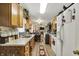 Traditional eat-in kitchen with vintage cabinetry, white appliances, and decorative touches at 2608 E 500 N, Whiteland, IN 46184