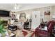 Inviting living room with a cozy fireplace, ceiling fan, and comfortable seating at 2608 E 500 N, Whiteland, IN 46184
