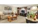 Inviting living room with comfortable furnishings, a decorative clock, and a warm, welcoming atmosphere at 2608 E 500 N, Whiteland, IN 46184