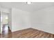 Bedroom with clean white walls and wood-look flooring, showing the doorway and interior at 2642 Country Estates Dr, Indianapolis, IN 46227