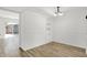 Bright dining area features wood-look floors and sliding doors at 2642 Country Estates Dr, Indianapolis, IN 46227