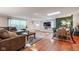 Comfortable living room with hardwood floors and a view of the backyard at 3312 W 42Nd St, Indianapolis, IN 46228