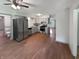 Modern kitchen featuring stainless steel appliances and ample cabinet space, open to the dining area at 3344 Southwest Dr, Indianapolis, IN 46241