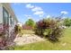 A vibrant backyard with lush greenery, offering a private and serene outdoor space at 3423 Summer Breeze Cir, Indianapolis, IN 46239