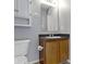 Bathroom with vanity sink, mirror, toilet, and overhead lighting at 3423 Summer Breeze Cir, Indianapolis, IN 46239