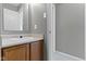 Bathroom featuring single sink vanity and door leading to hallway at 3423 Summer Breeze Cir, Indianapolis, IN 46239