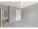 This neutral bedroom offers a ceiling fan, carpeting, and a closet at 3423 Summer Breeze Cir, Indianapolis, IN 46239