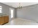 Dining room featuring tile floors and a door to the exterior at 3423 Summer Breeze Cir, Indianapolis, IN 46239