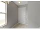 Light and bright entryway featuring neutral paint colors, a large window, and durable tile flooring at 3423 Summer Breeze Cir, Indianapolis, IN 46239