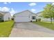Charming single-story home featuring a well-maintained lawn and an attached two-car garage at 3423 Summer Breeze Cir, Indianapolis, IN 46239