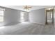 Spacious living room with neutral carpet and paint, and lots of natural light at 3423 Summer Breeze Cir, Indianapolis, IN 46239