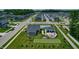An aerial view of a neighborhood featuring a community pool, clubhouse, and bocce ball court at 3613 Lehigh Ave, Westfield, IN 46074