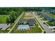 Aerial view showcasing a community pool, clubhouse, and newly constructed homes at 3613 Lehigh Ave, Westfield, IN 46074