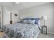 Bright bedroom with a large bed, soft carpet, and a ceiling fan for added comfort at 3613 Lehigh Ave, Westfield, IN 46074