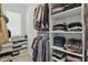 Organized walk-in closet with shelves and hanging racks, perfect for ample storage at 3613 Lehigh Ave, Westfield, IN 46074
