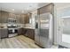 Modern kitchen featuring stainless steel appliances, wood cabinets and neutral-colored walls at 3613 Lehigh Ave, Westfield, IN 46074