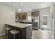 Modern kitchen features stainless steel appliances, speckled quartz countertops and a breakfast bar at 3613 Lehigh Ave, Westfield, IN 46074