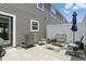Cozy patio area with outdoor seating, a grill, and a fenced yard at 3613 Lehigh Ave, Westfield, IN 46074
