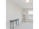 Bedroom with light carpet and a table with a lamp, showing natural light through a window at 3643 Thomas Jefferson St, Westfield, IN 46074