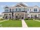 Inviting townhomes with stone accents, manicured lawns, and welcoming front porches, perfect for suburban living at 3643 Thomas Jefferson St, Westfield, IN 46074