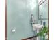 Light blue half bathroom with updated sink and a decorative plant at 3715 Pitkin Rd, Martinsville, IN 46151