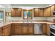 Efficient kitchen offers stainless steel appliances and wood cabinets, perfect for meal preparation at 3715 Pitkin Rd, Martinsville, IN 46151