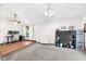 Large living room with ceiling fan and a combination of carpet and wood flooring at 3715 Pitkin Rd, Martinsville, IN 46151