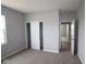 Bedroom with neutral carpet, ample closet space and a connecting hallway to the rest of the home at 3824 Dutton Dr, Bargersville, IN 46106