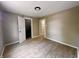 This bedroom boasts vinyl floors and neutral-toned walls at 3835 N Kenwood Ave, Indianapolis, IN 46208