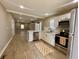 Bright kitchen featuring stainless steel appliances, an open-concept and natural light at 3835 N Kenwood Ave, Indianapolis, IN 46208