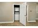 Conveniently located laundry closet with stacked washer and dryer for easy access at 3835 N Kenwood Ave, Indianapolis, IN 46208
