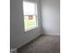 This bedroom features neutral walls, carpet, and a window at 3993 Bozeman Way, Bargersville, IN 46106